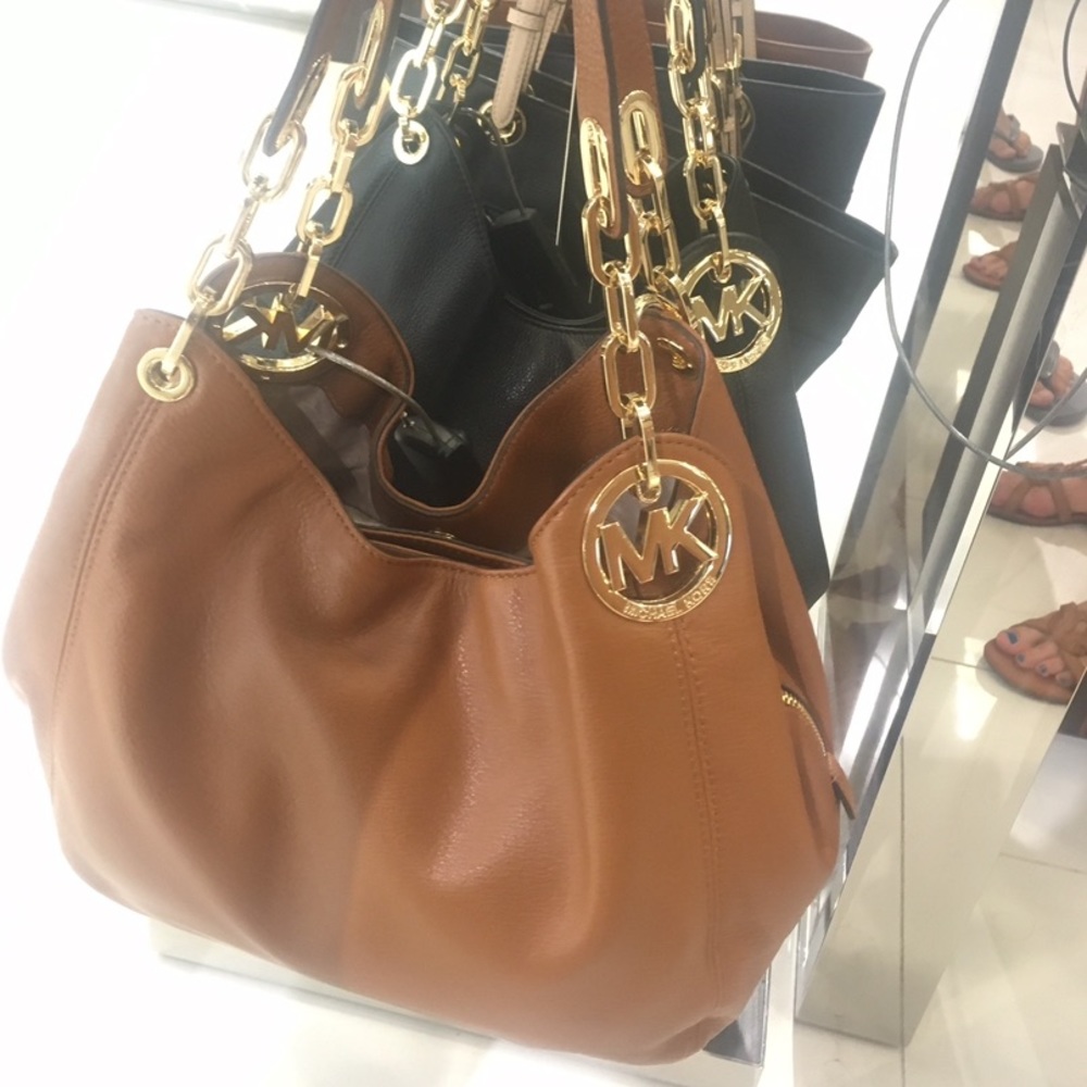 Michael Kors brown/gold pocket book/purse hardly used